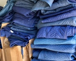 Hundreds of like new quilted moving blankets! 