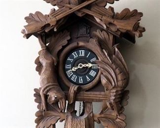 Large Vintage German Wood 8-Day Cuckoo Clock With Stag, Rabbit, And Game Bird Motif