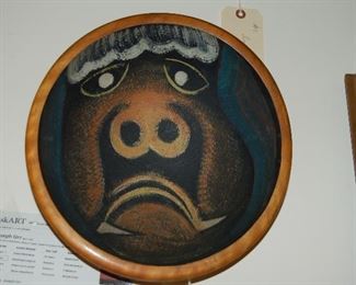 Cow face in old wooden bowl