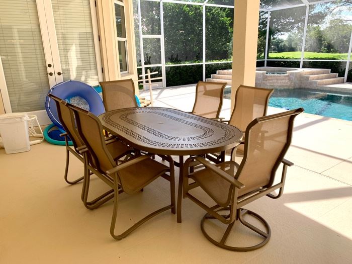 Windward Design Group patio set “ Punched Mayan” aluminum with 6 matching chairs. All in excellent condition!”