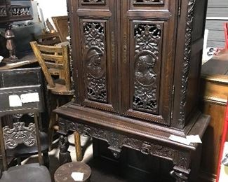 Rare French Breton cupboard with full figure carvings