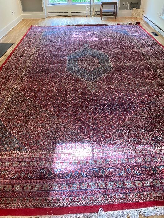 Huge Persian room-sized rug- hand-knotted in fine condition.  Clean example with a bold color palette and center cartouche