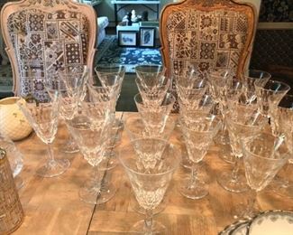 this very large set of crystal glasses is signed, but WE cannot read the sigature.  Maybe you can!