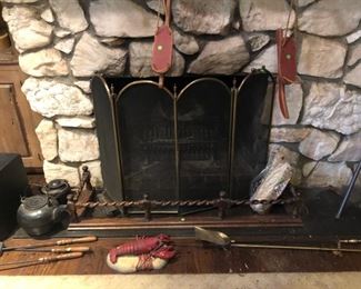 wonderful wooden fireplace surround.  two large cast iron water pots