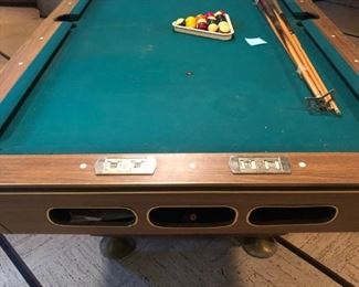 the 8 foot pool table.  In great shape with intact slate.  we have a mover for you