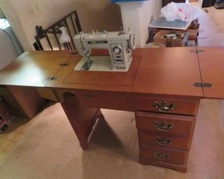 brother sewing machine w/cabinet. works great!