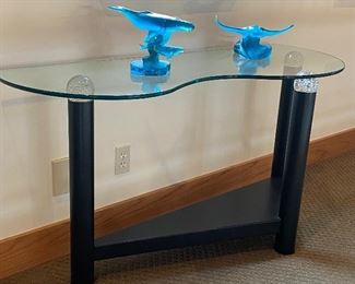 Contemporary glass table with black column legs and crystal ball top supports. There’s a pair of these.