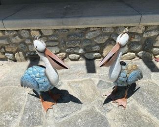 Metal pelicans garden art