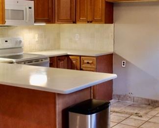 Wood cabinets solid wood dovetail drawers. If you are interested in the kitchen cabinets I have measurements and layout of the entire kitchen I can email or text you photos