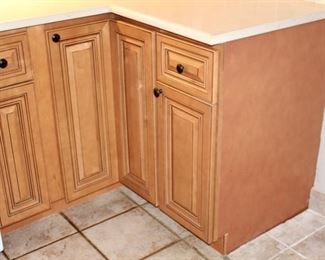 Wood cabinets solid wood dovetail drawers. If you are interested in the kitchen cabinets I have measurements and layout of the entire kitchen I can email or text you photos