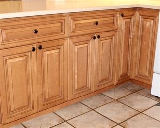 Wood cabinets solid wood dovetail drawers. If you are interested in the kitchen cabinets I have measurements and layout of the entire kitchen I can email or text you photos