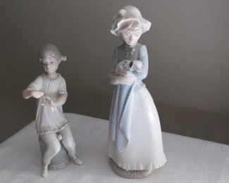 2 Lladro - one has a small amount of damage