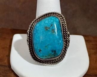 #13...Old pawn silver ring with turquoise cabochon. Beautiful cabochon is set in smooth bezel then framed by a double row of twisted rope-style silver wire. Ring size 13 1/4 - 13 1/2. Turquoise is 1" tall. $250