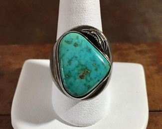 #62...Awesome size 10 Native American made ring with a large triangular shaped turquoise cabochon highlighted with a small silver feather on top. Solid silver band. Turquoise cabochon size is 5/8" x 13/16". $220