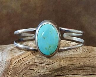 #53...Signed Mexican sterling and howlite cuff bracelet. Total circ. 6 3/4" (5 5/8" inner circ. with 1 1/8" gap). Size of framed cabochon is 3/4" x 1 1/8". $140