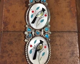 #43...Exquisite sterling silver Zuni inlay pendant featuring two cabochons of birds and flowers composed of precisely cut coral, turquoise, onyx, abalone and mother of pearl inlays. Other fabulous details include turquoise nuggets and silver rain drops adorning the tops of each cabochon. Size 1 1/8" x 3". Hidden bale. $345