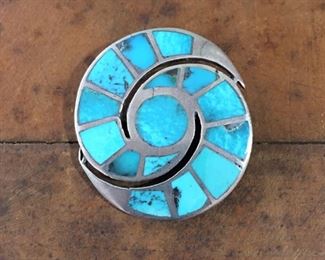 #77...Beautiful Native American made sterling silver and turquoise inlay brooch in a pinwheel motif. Could be worn horizontally or vertically. Size 1 1/4" x 1 3/8". $150