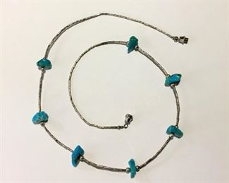#81...Liquid silver 20" necklace with sterling silver tube beads and seven beautiful turquoise beads. Screw clasp. Classic. $130