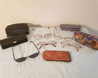 Prescription glasses and sunglasses with cases 