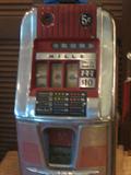 1950' MILLS TRIPLE 7 SLOT MACHINE IN GOOD WORKING ORDER
