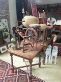 Miniature portable spinning wheel, meant to be able to break down to individual pieces. English Pub Table. Indian coil baskets