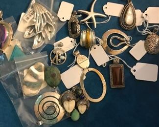 Interesting designer sterling pendants with a large assortment of Bali in various of these photos