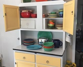 Restored Hoosier cabinet.  Vintage Fiesta pieces.