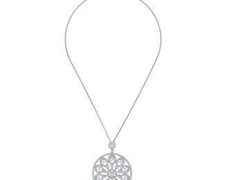 A DIAMOND PENDANT WITH CHAIN
Delicate filigree fashion pendant with chain, 18K white gold setting and chain containing a total of 3.00 carats of white diamonds. Natural untreated diamonds, near colorless white, slightly included.