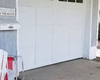 Newer garage door with opener. Door is 9 ft. wide x 8 ft. tall