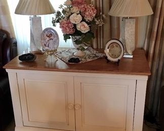 Excellent White Wood Cabinet with Wood tone top.