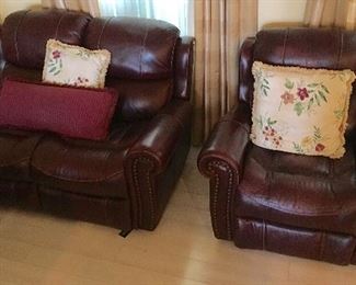 High End Burgundy Red Recliners, single and double.