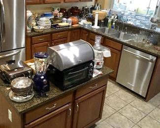 Nice Clean Kitchen items, blender, Toaster oven, & more.