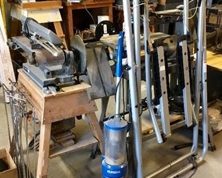 Shop tools, Exercise machine, plus several vacuums.