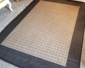 Outdoor area rug. 5 × 7' 3"