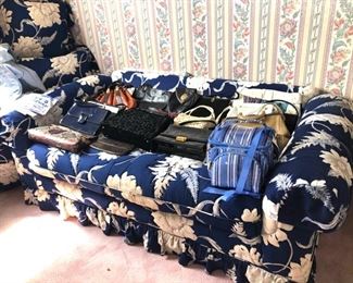 Pair blue floral sofas & bags 