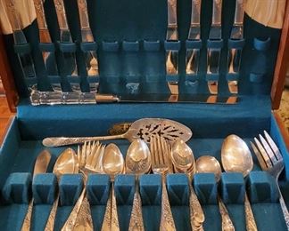 Many flatware sets