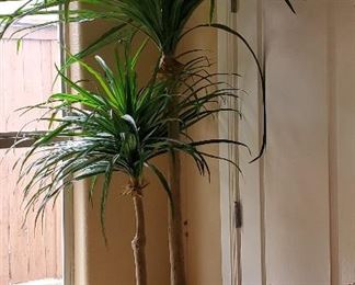 Large faux trees throughout 