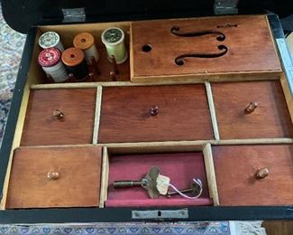 Inside of sewing box/table