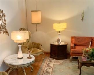 Mid Century Swag Lamp, pair of 50s lamps, cool orange couch, coffee table, end table and rug