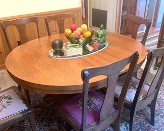 antique oak table with 6 needlepoint seat chairs