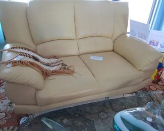 Light yellow chrome legs leather settee