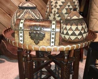 Woven Zulu circular baskets, covered.