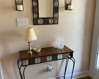 Entry table, mirror and sconces.