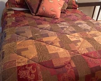 Queen comforter set over like new Sealy Queen mattress, boxsprings and frame.