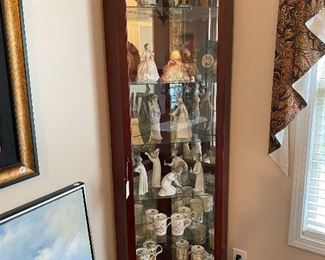 lighted, mirrored, corner curio cabinet