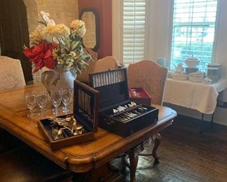 Silverware sets, China, and dining room furniture