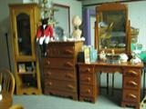 Unique chest and dressing table with spinning-wheel carved into wood