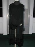 Another great 1920's dress. Sheer slip with rhinestone bow accent. Also in great condition.