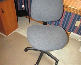Adjustable height office chair. 38" tall x 21" wide. PRICE: $20.00