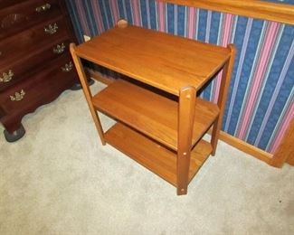 Solid oak 3-tier stand. 25" wide x 25" tall x 13.5" deep. PRICE: $40.00